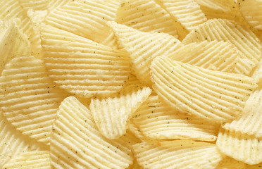 background corrugated golden chips with texture