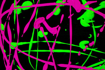 Obraz na płótnie Canvas Paint Splats and Spots Neon Colours on Black Background Abstract Fun for Background