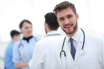Fototapeta premium Portrait of friendly male doctor smiling