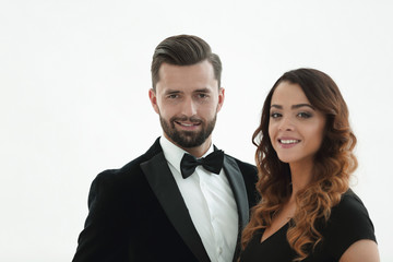 Portrait of a handsome man looking at the camera with a woman