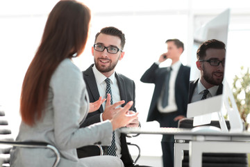 Confident man talking to his interviewer during a job interview