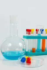 Tools and equipment for chemical research on a white background
