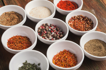 Diverse spices in small cups