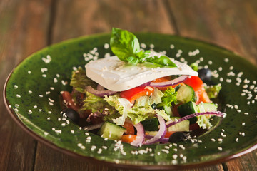 Fresh spring vegetable salad with feta cheese