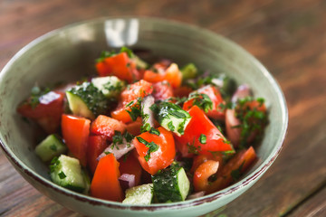 Vegetable salad from pepper, tomato and cucumber