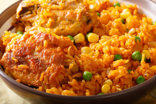 Delicious Brazilian chicken and rice Galinhada Mineira close-up. horizontal