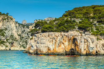 Colorful kayaks in the rocky bay, Calanques national park, France