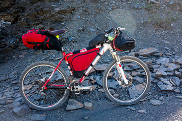 Fototapeta premium Mountain bicycle prepared for distant travel