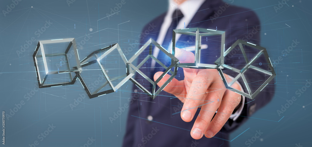Poster businessman holding a 3d rendering blockchain cube isolated on a background