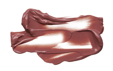 Texture of brown lipstick isolated on white. Smear of broken brown lip gloss