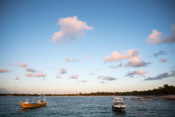 Boats and sunrise in Cancun Mexico