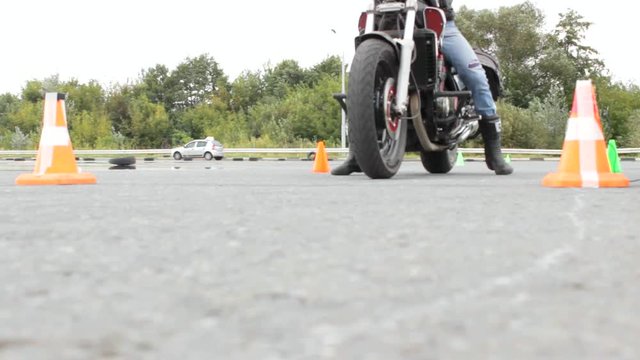 The motorcyclist drove up to the start of the motorcycle, a Moto gymkhana competition