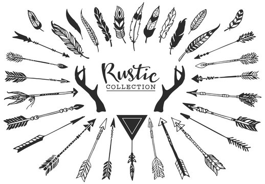 Rustic decorative antlers, arrows and feathers. Hand drawn vintage vector design set.
