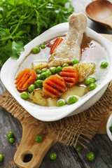 Chicken soup with green peas