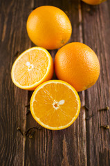 Orange slices on a wooden table