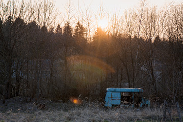 old destroyed abandoned bus during sunset beautiful sunset
