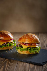Hamburger with cutlet and cheese.