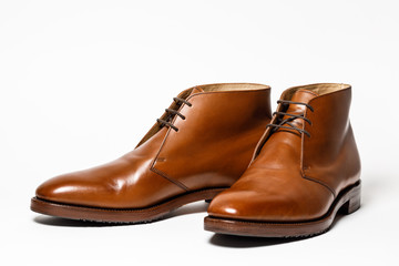 Men's classic brown leather shoes isolated on white background