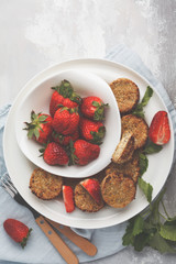 Vegan sweet tofu fritters with strawberries, top view. Healthy vegan food concept.