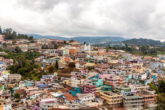 Aerial view of Coonoor town nestled in the Nilgiri hills, India.