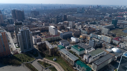 Naklejka na ściany i meble Aerial view above Kiev bussines and industry city landscape.