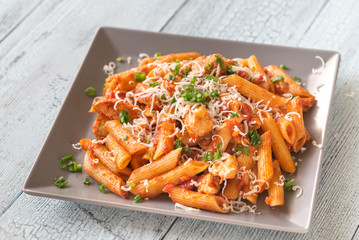 Portion of cheesy chicken pasta
