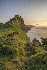 Stunning Valley Of The Rocks landscape in Devon during Summer sunset