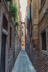 Fototapeta na wymiar traditional narrow buildings of Venice