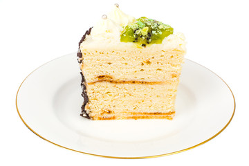 White plate with piece of homemade cottage cheese cake with fruit and custard
