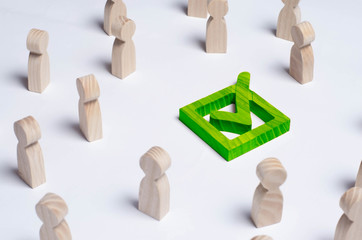 People gathered around the checkbox on a white background. People make a group choice. Democratic...
