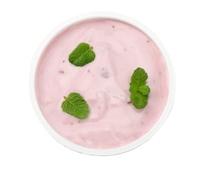 Healthy raspberries yogurt with mint leaves isolated on white background. Top view.