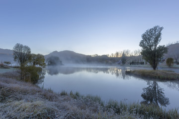 Mist on the water in early morning light