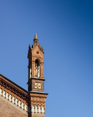 Fototapeta na wymiar Close up of the front facade of Santa Maria del Carmine Church in Brera neighbourhood of Milan, Italy.
