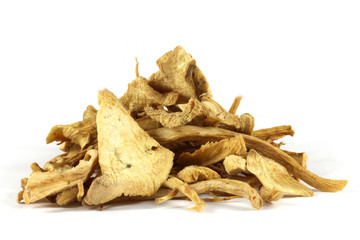 Dried root of elecampane (Inula helenium) isolated on white.