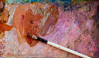 Brush artist and palette. Artist's workshop.