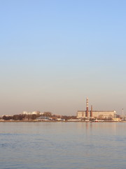 a wide river in the city in the spring evening