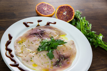 A delicious carpaccio of fresh Mediterranean swordfish, seasoned with extra virgin olive oil,...