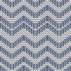 Seamless knitted ornament. Zigzags and lines.