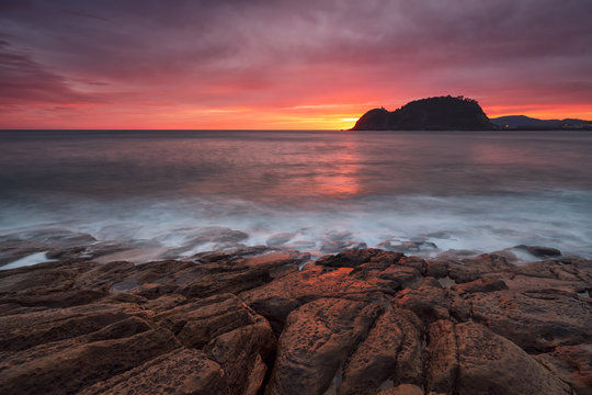 Colorful sunrise in Cantabric sea,  Getaria, Gipuzkoa