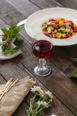 vegetables - a set of ingredients for salad (tomato, cucumber, radish, pepper, arugula, basil, parsley, dill, herbs, herbs, radish and others)
