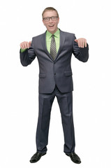 Fototapeta premium Businessman looks out from some copy space in front of him for placard or poster message. Special offer template. Product presentation.