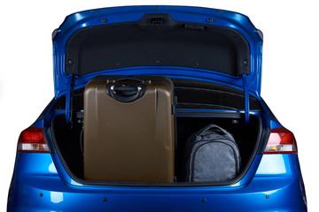 Luggage in blue modern sedan car trunk