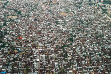 Zanzibar shanty town rusty roofs aerial view