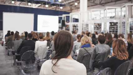 Business woman and people Listening on The Conference. Horizontal Image