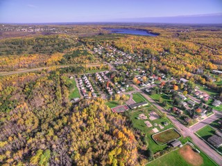 Small Town New Eveleth, Minnesota in Autumn seen by Drone