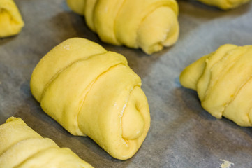 raw homemade croissants with sweet filling