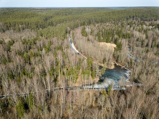 drone image. aerial view of frozen riverbank in spring, Gauja, Latvia