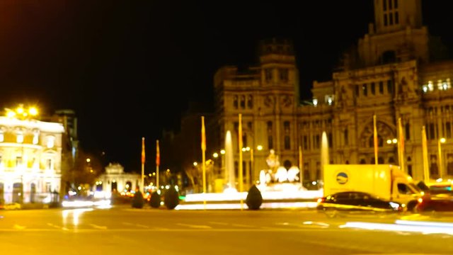 Cibeles fountain in Madrid. Night traffic in Madrid. Timelapse. Spain. Fountain is built in 1782. 