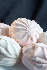 White zephyr marshmallow on porcelain plate