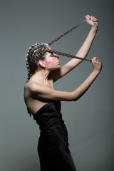 Woman with makeup and hairstyle, hairdresser. Cosmetics for visage and skincare, barbershop. Beauty and fashion girl. Fashion look of stylish girl, art. Woman with glamour makeup and hair.